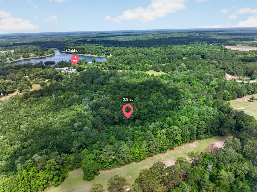 This expansive 3.9-acre parcel in Dogwood Lakes Estates, a - photo 2