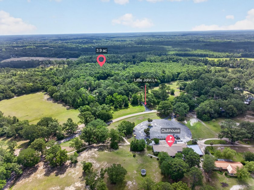 This expansive 3.9-acre parcel in Dogwood Lakes Estates, a - photo 8