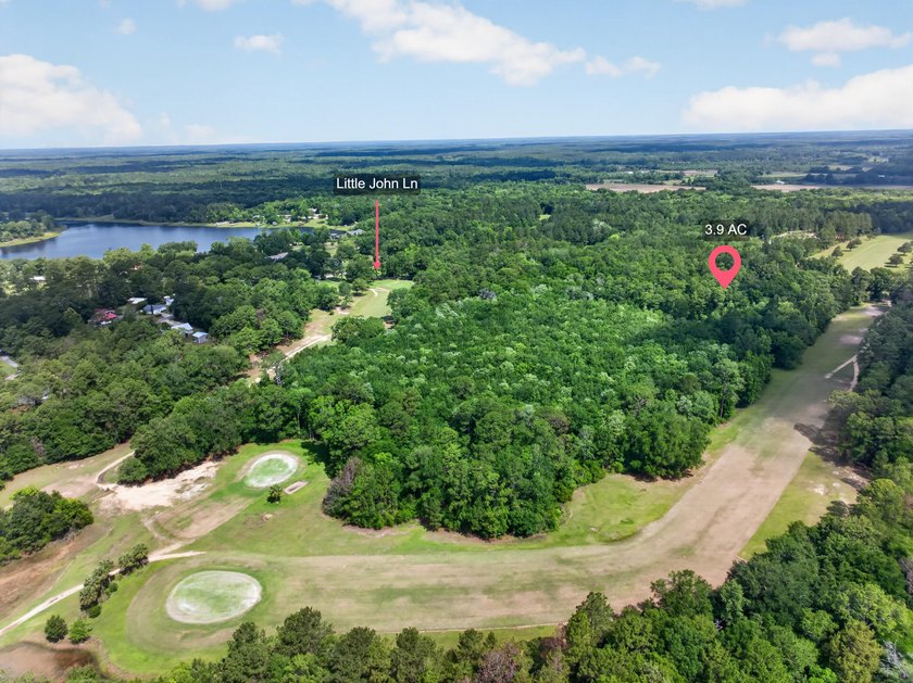 This expansive 3.9-acre parcel in Dogwood Lakes Estates, a - photo 10