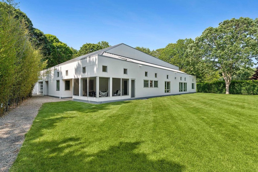 Located on a quiet lane in the heart of Sagaponack Village, this - photo 2