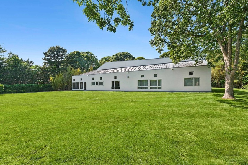 Located on a quiet lane in the heart of Sagaponack Village, this - photo 4
