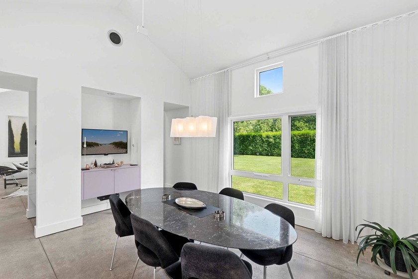 Located on a quiet lane in the heart of Sagaponack Village, this - photo 9