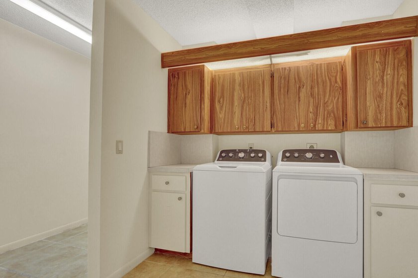 Move-in ready first floor unit, just steps from the - photo 23