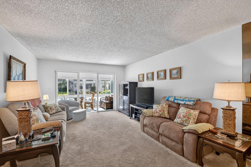 Welcome home to this beautifully maintained first-floor condo - photo 26