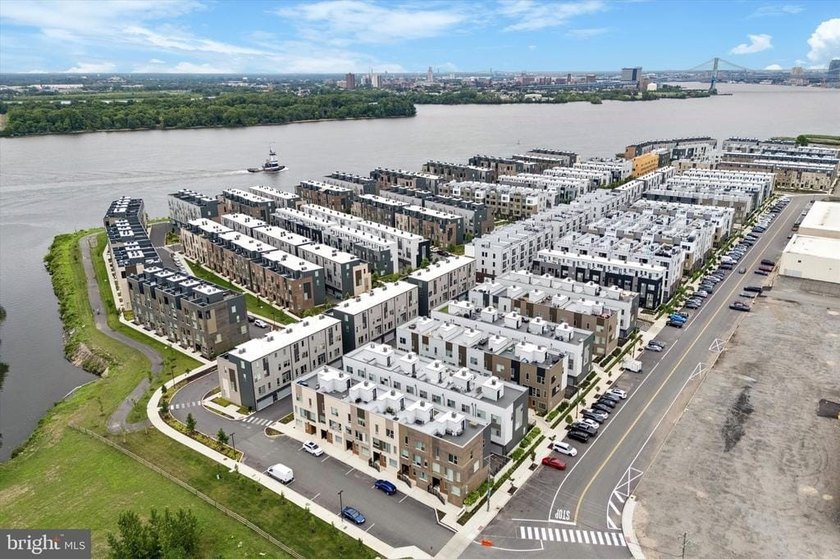 Experience modern riverfront living at its finest in one of - photo 44