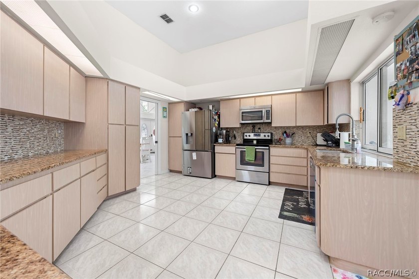 Welcome to this former model home tucked away on a private - photo 11