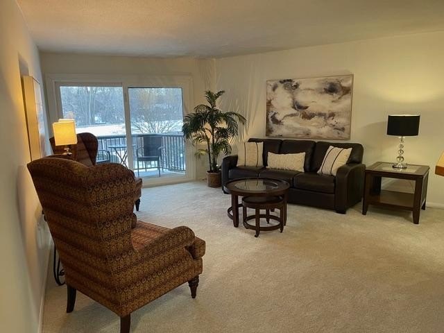 New carpet- fresh paint! Great views from this 3rd floor unit! - photo 2