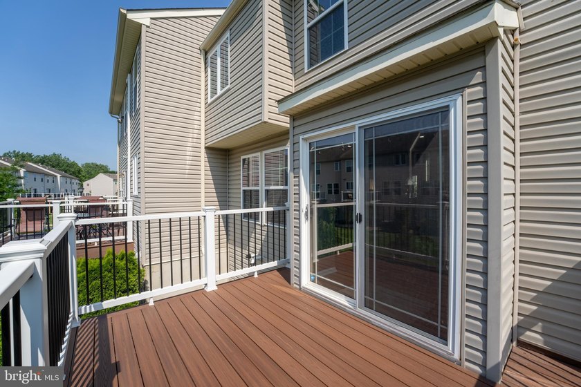 Welcome to this beautifully maintained end-unit townhome in the - photo 14