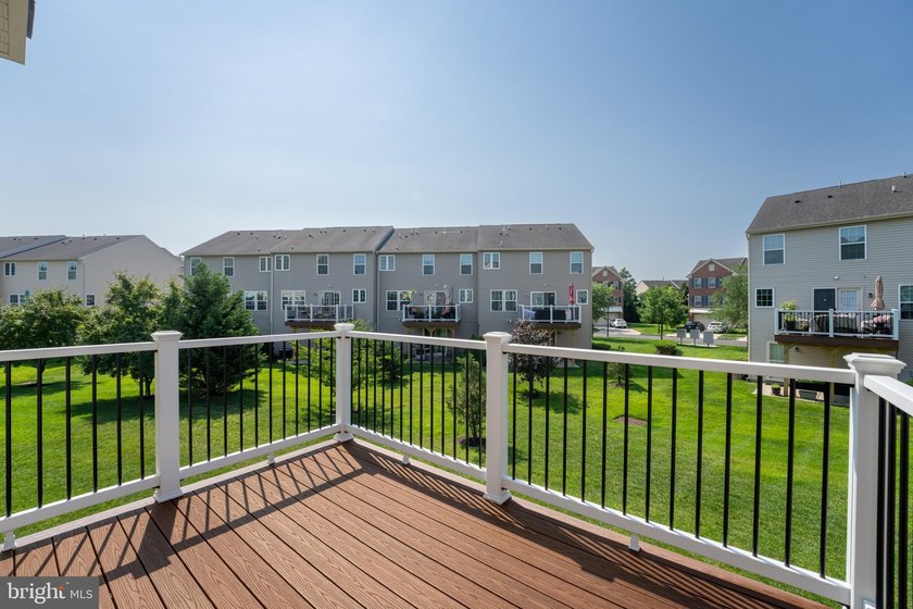 Welcome to this beautifully maintained end-unit townhome in the - photo 15