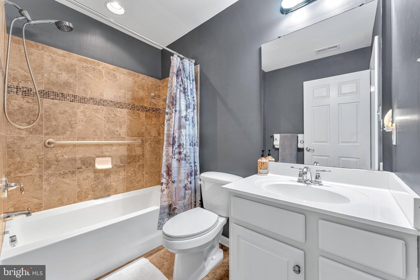 Welcome to this beautifully maintained end-unit townhome in the - photo 19