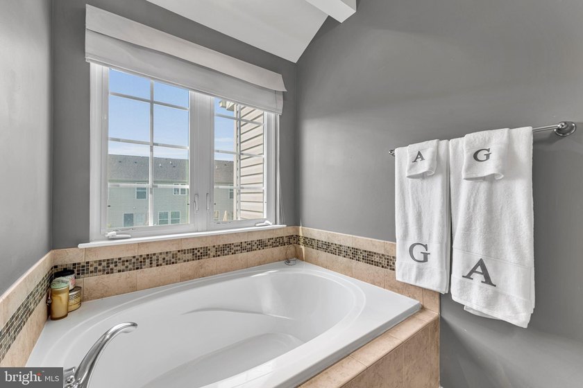 Welcome to this beautifully maintained end-unit townhome in the - photo 20
