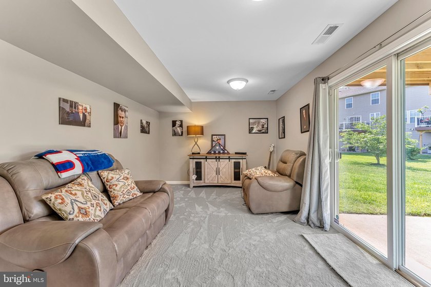 Welcome to this beautifully maintained end-unit townhome in the - photo 30