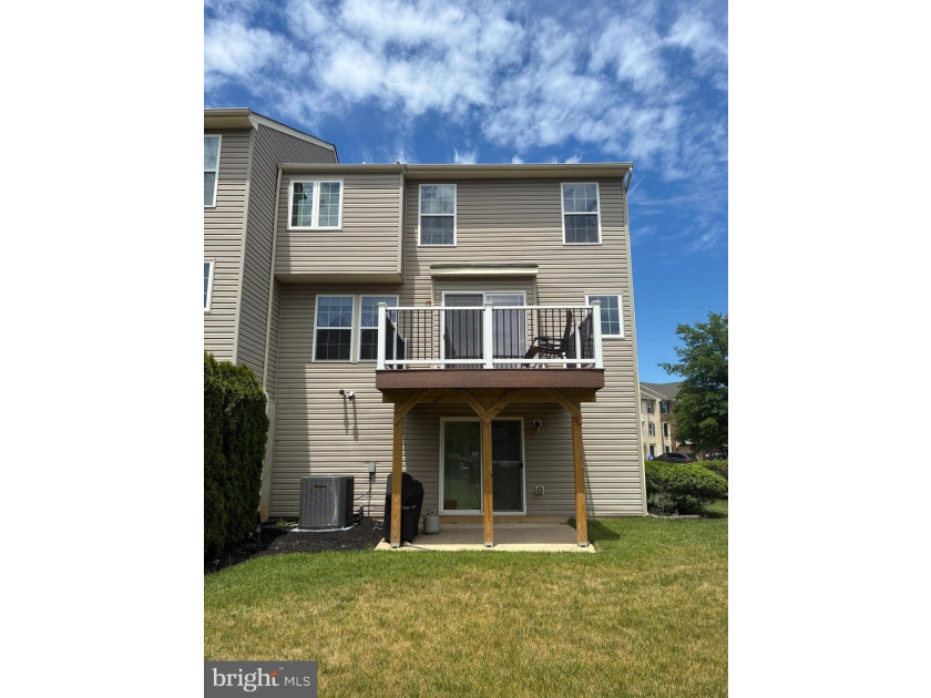 Welcome to this beautifully maintained end-unit townhome in the - photo 42