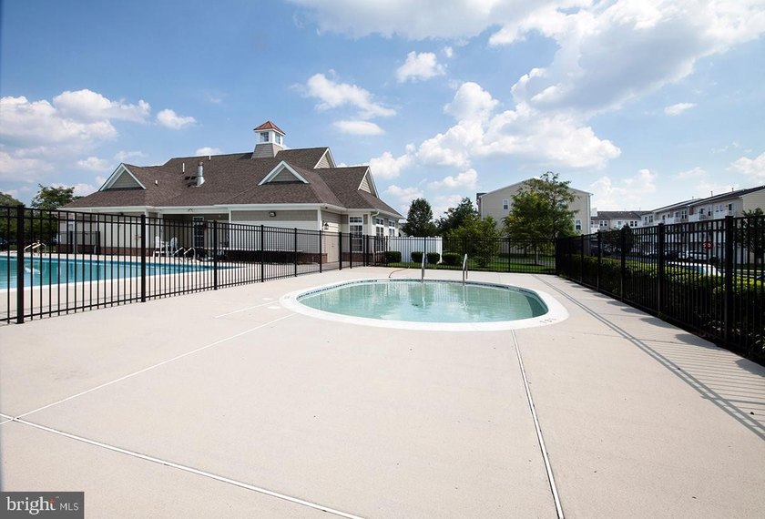 Welcome to this beautifully maintained end-unit townhome in the - photo 46