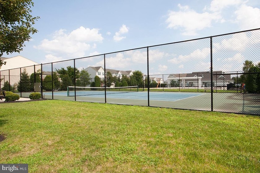 Welcome to this beautifully maintained end-unit townhome in the - photo 48