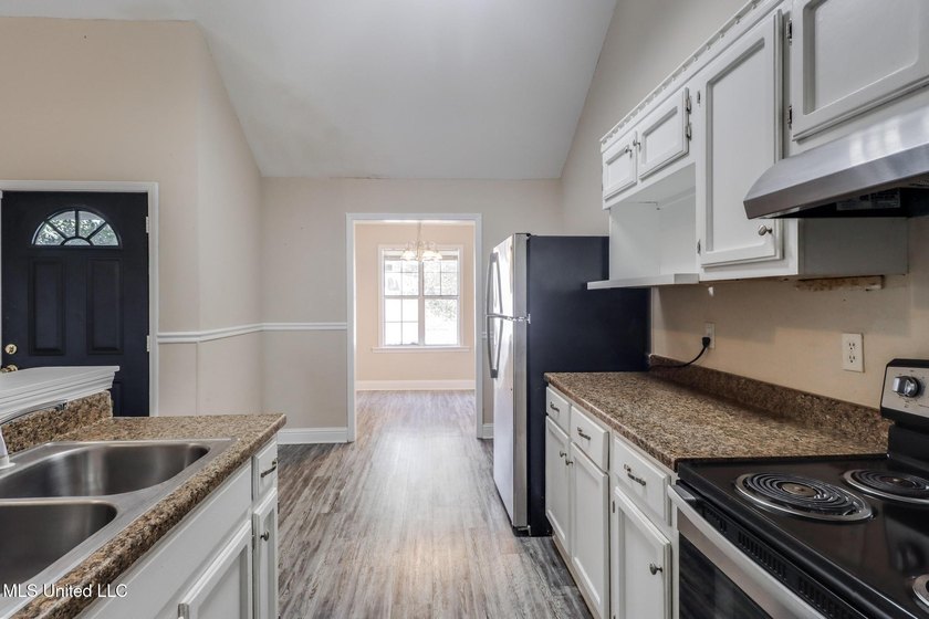 Welcome to this inviting, single-family home nestled in the - photo 6