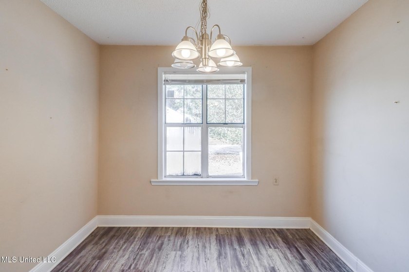 Welcome to this inviting, single-family home nestled in the - photo 8