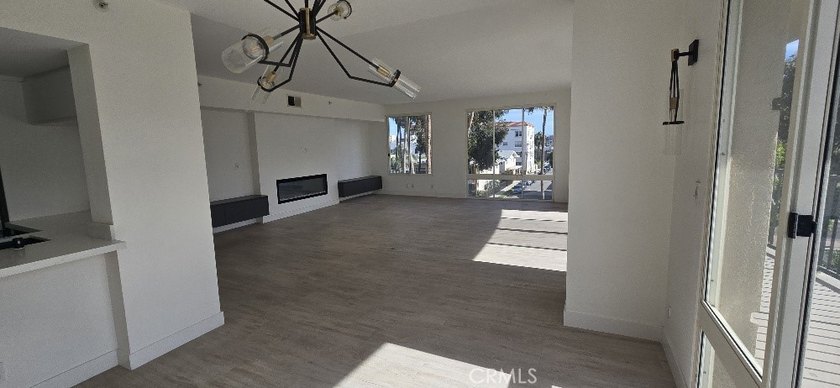 Experience the ultimate beachfront lifestyle in this beautifully - photo 14