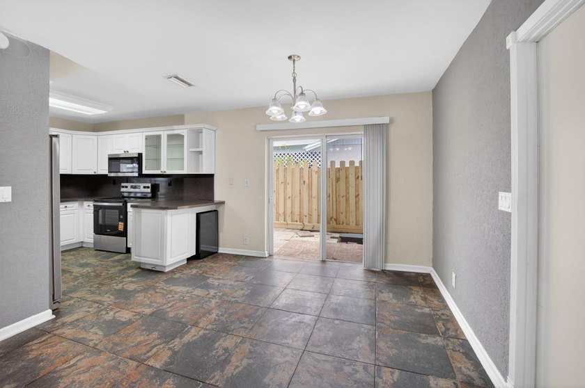 Come see this large 3 bedroom, 2 bathroom home with attached - photo 14