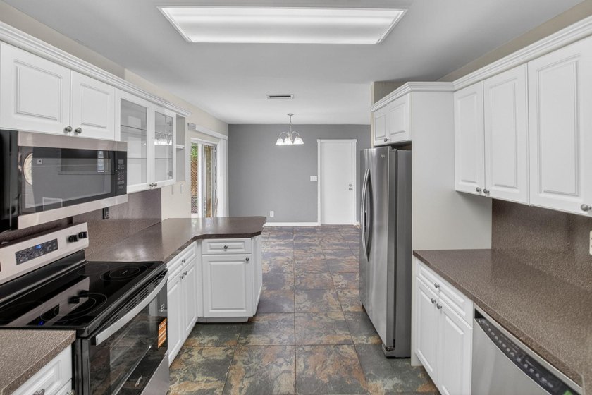 Come see this large 3 bedroom, 2 bathroom home with attached - photo 18