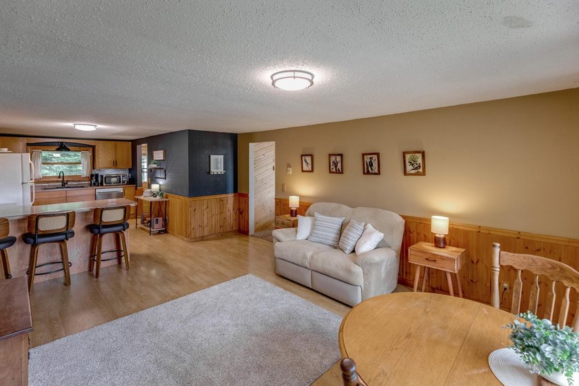 Towering mature pine trees on 5 private acres, this beautiful - photo 11
