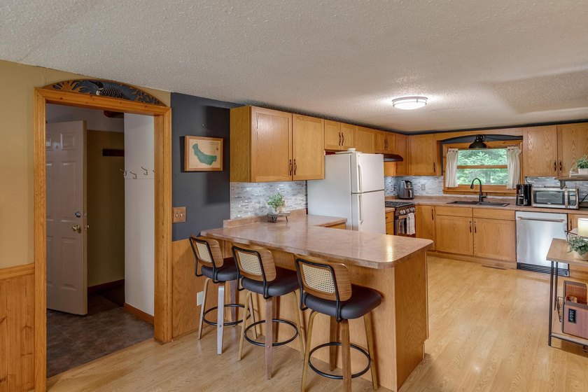 Towering mature pine trees on 5 private acres, this beautiful - photo 12