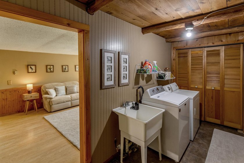 Towering mature pine trees on 5 private acres, this beautiful - photo 16
