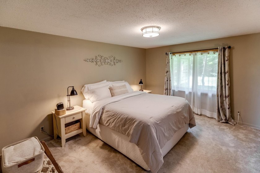 Towering mature pine trees on 5 private acres, this beautiful - photo 17
