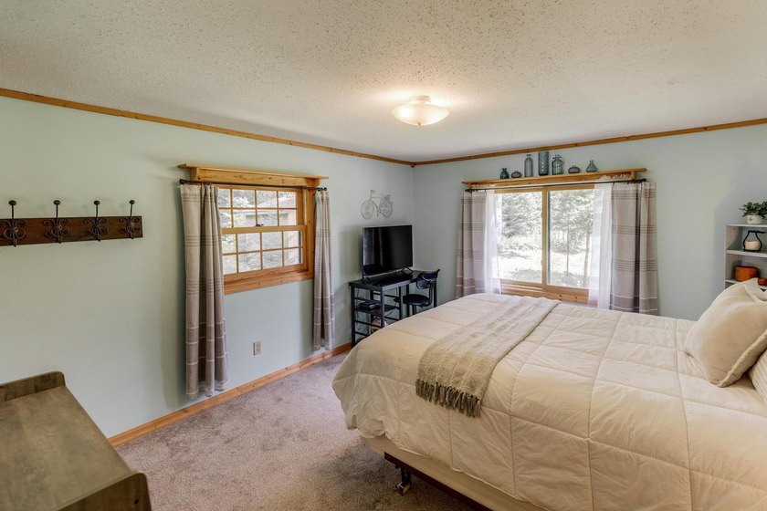 Towering mature pine trees on 5 private acres, this beautiful - photo 19
