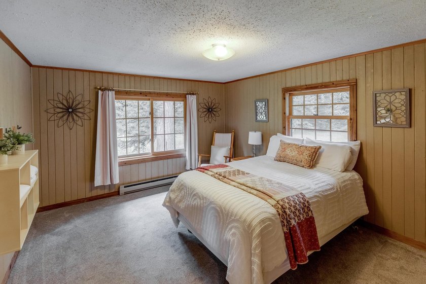Towering mature pine trees on 5 private acres, this beautiful - photo 20