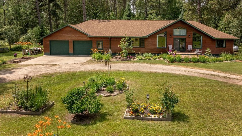Towering mature pine trees on 5 private acres, this beautiful - photo 31