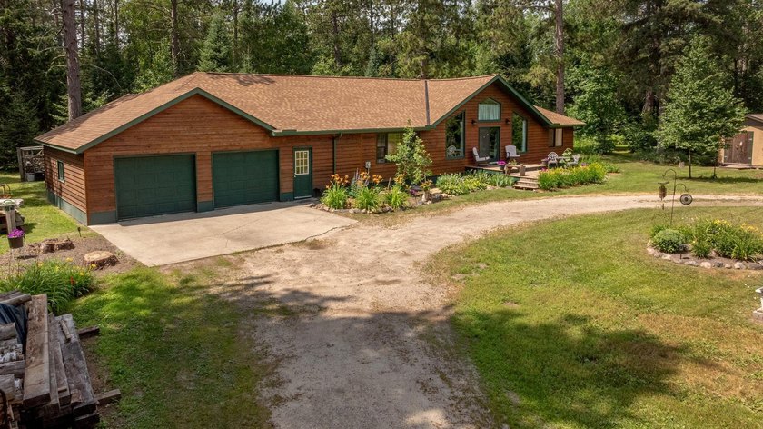 Towering mature pine trees on 5 private acres, this beautiful - photo 32