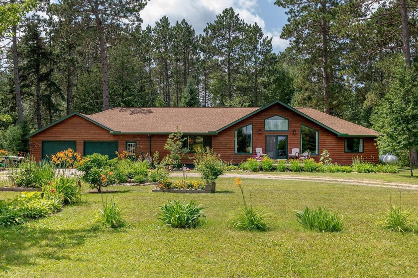 Towering mature pine trees on 5 private acres, this beautiful - photo 33