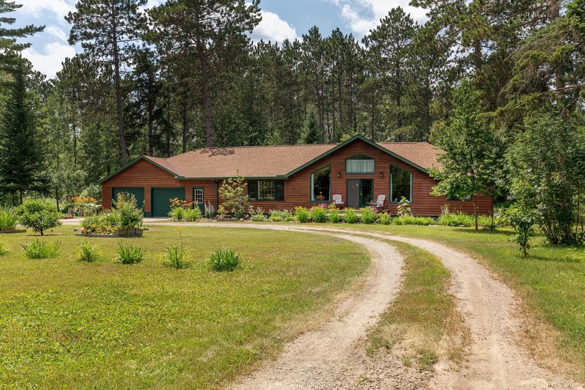 Towering mature pine trees on 5 private acres, this beautiful - photo 34