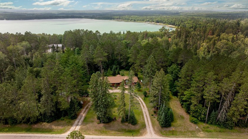 Towering mature pine trees on 5 private acres, this beautiful - photo 37