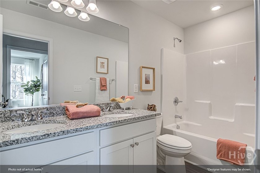 The Russell is a versatile two-story home featuring four - photo 25