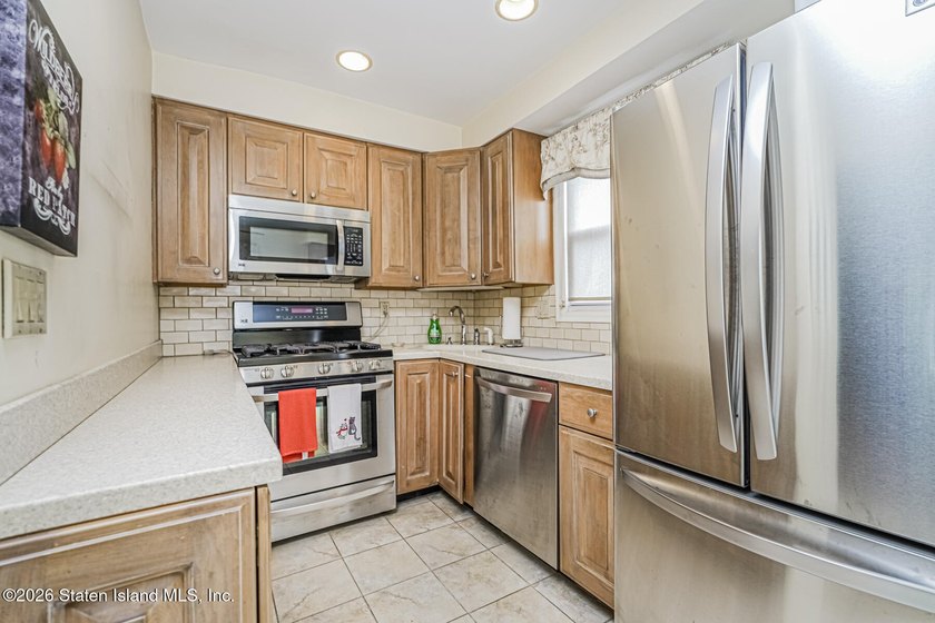 Welcome to this spacious semi-detached home located in one of - photo 12
