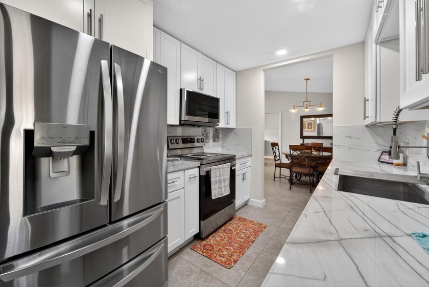 Move right into this beautifully renovated home where everything - photo 14