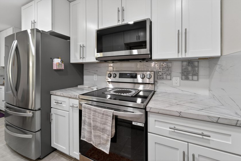 Move right into this beautifully renovated home where everything - photo 16