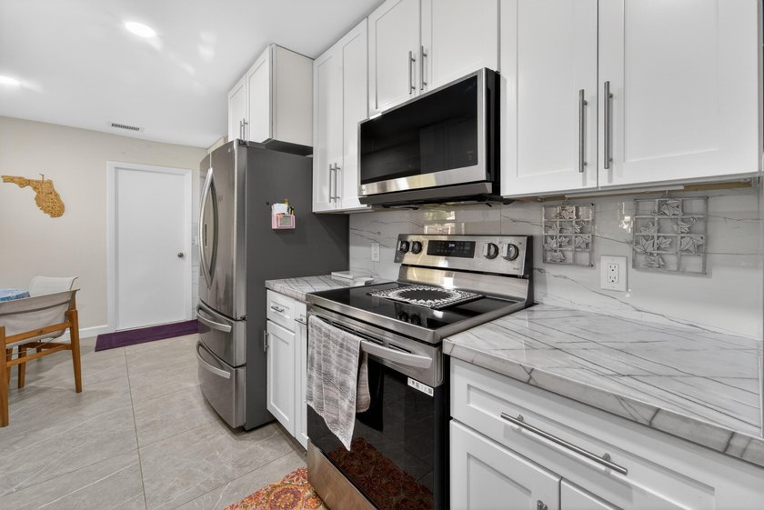 Move right into this beautifully renovated home where everything - photo 17