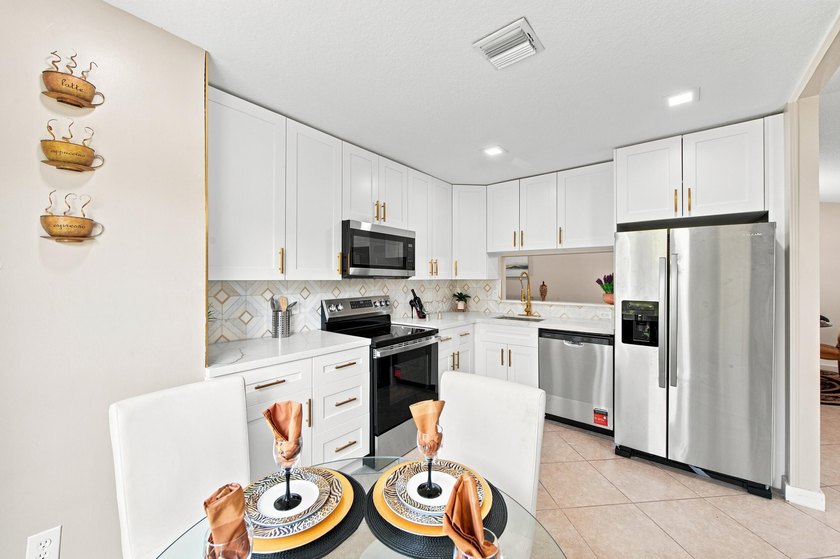 THIS STUNNING WATERFRONT CORNER HOME IN LAKESIDE GREEN IS THE - photo 11