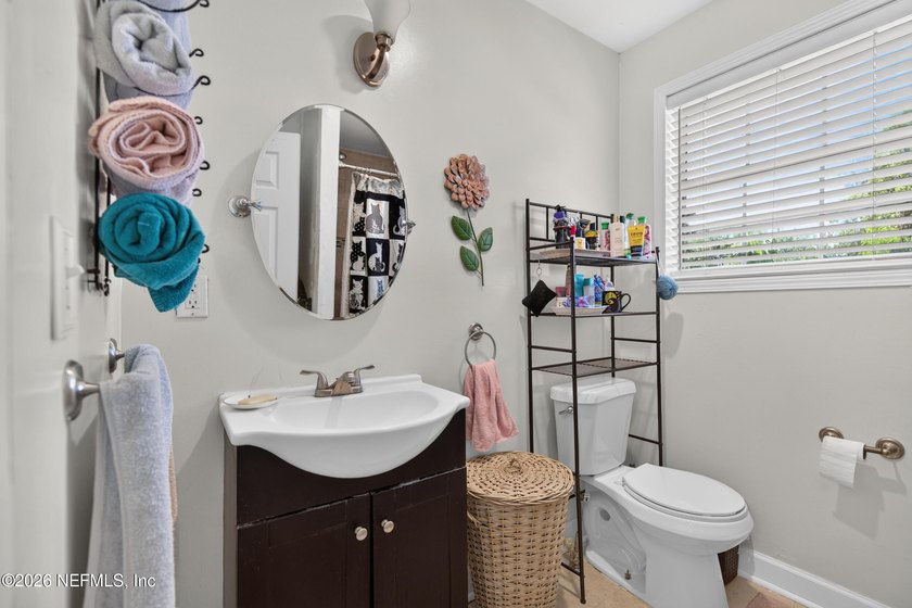 This home offers a blend of classic charm and modern updates in - photo 31
