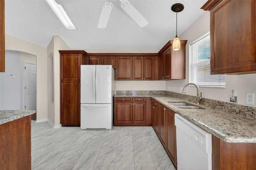 BOND PAID!! NO CARPET in This 3BR, 2BA ANNA MARIA COURTYARD - photo 12