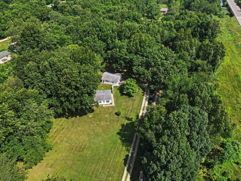 Move-in ready peace and tranquility await you! Situated on a - photo 4