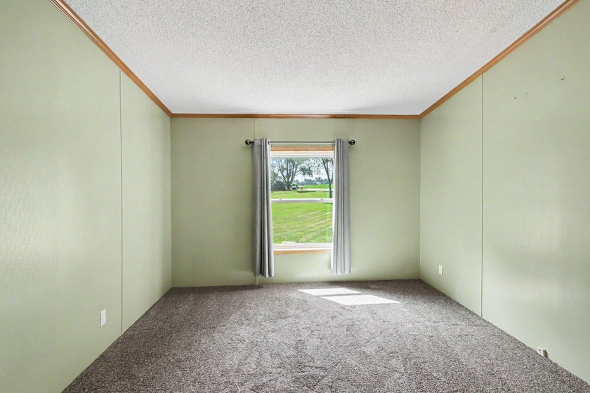 Move-in ready peace and tranquility await you! Situated on a - photo 10