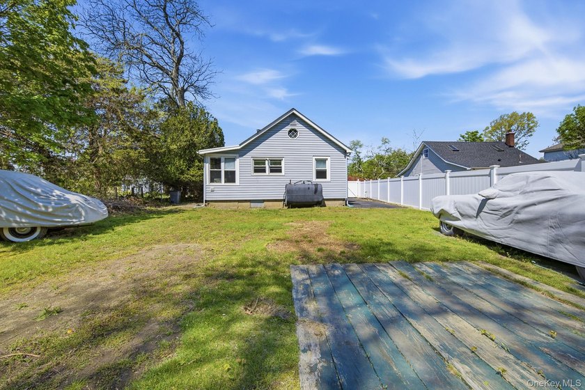 Welcome to 109 Grove Avenue, a 3-bedroom, 1-bath ranch set on a - photo 23