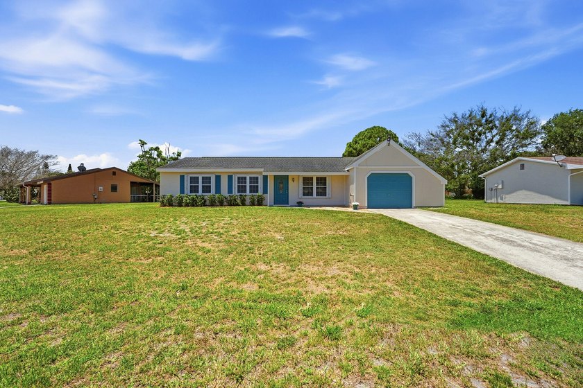 Bright and airy 3-bedroom, 2 full bath home situated on a rare - photo 2