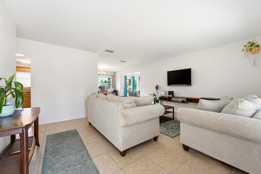 Bright and airy 3-bedroom, 2 full bath home situated on a rare - photo 6