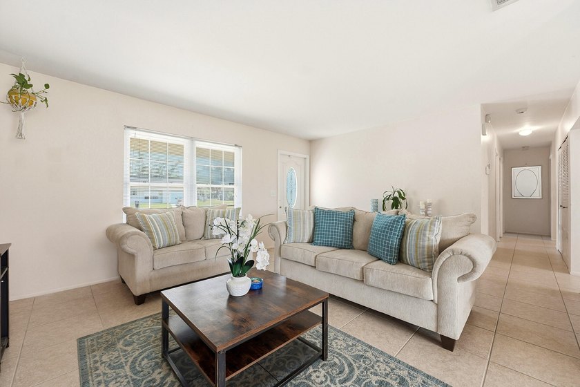 Bright and airy 3-bedroom, 2 full bath home situated on a rare - photo 9
