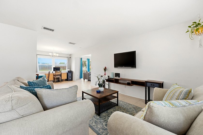 Bright and airy 3-bedroom, 2 full bath home situated on a rare - photo 10